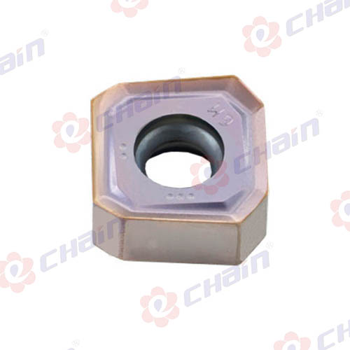 What are the primary factors to consider when determining the cutting speed and feed rate for a milling insert